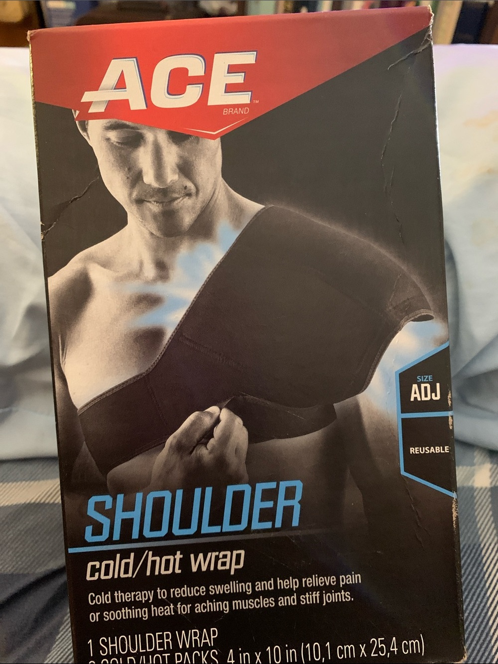 Ace & Jig black and red shoulder cold/hot wrap packaging